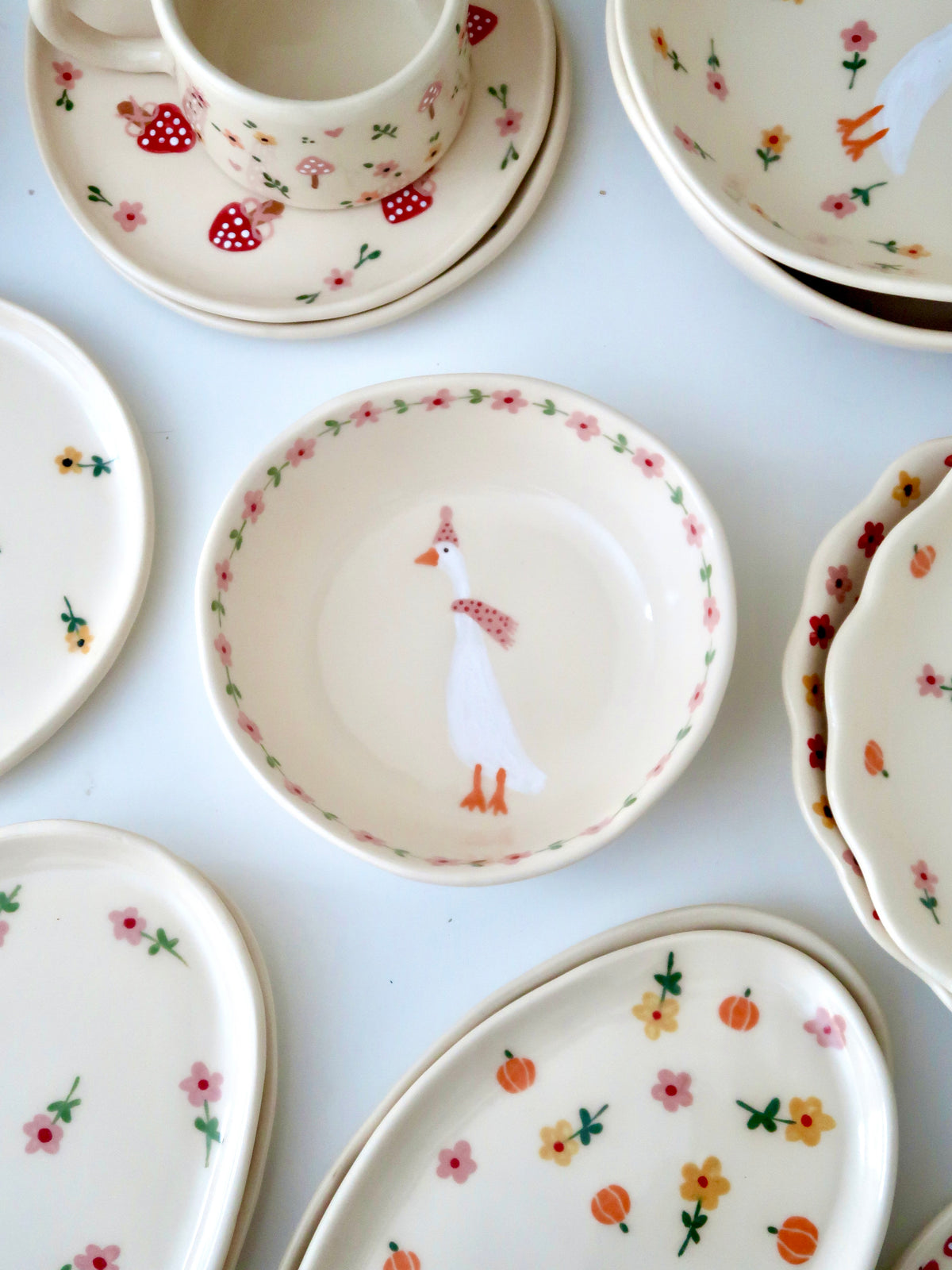 Bowl with a duck and pink flowers