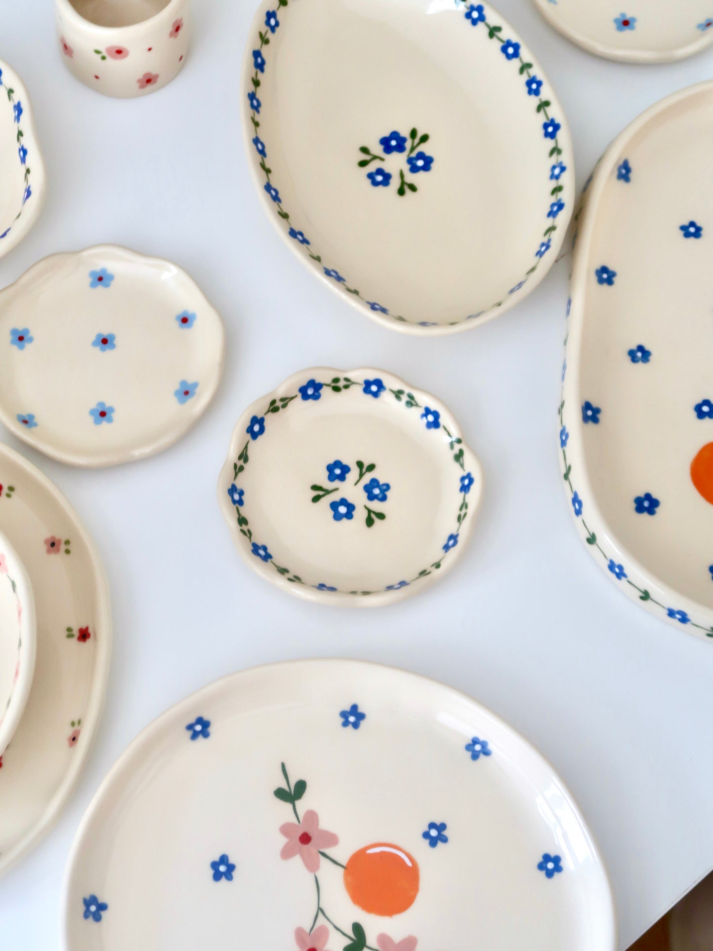 Scalloped ring dish with blue flowers