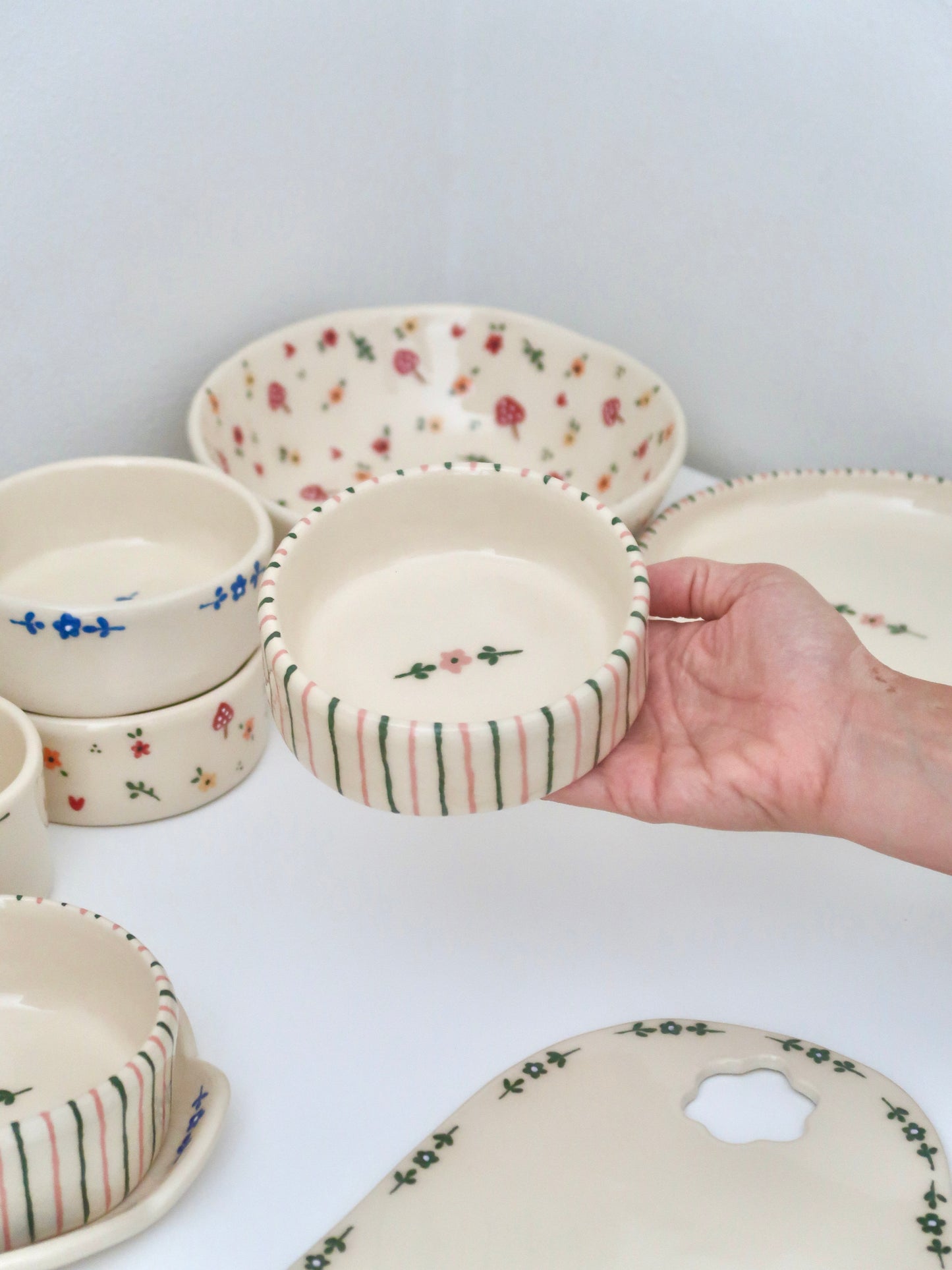 Bowl with green and pink flowers