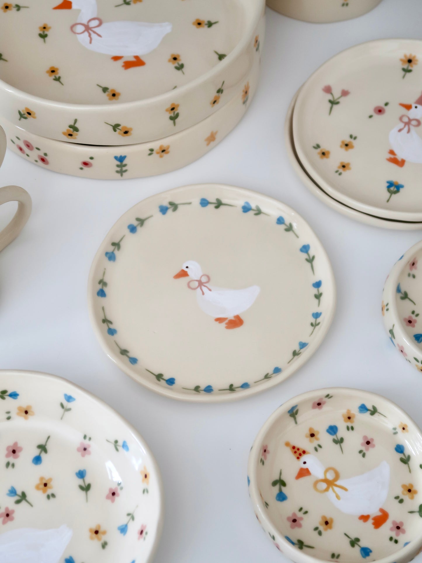 Breakfast/dessert plate with a duck and blue flowers