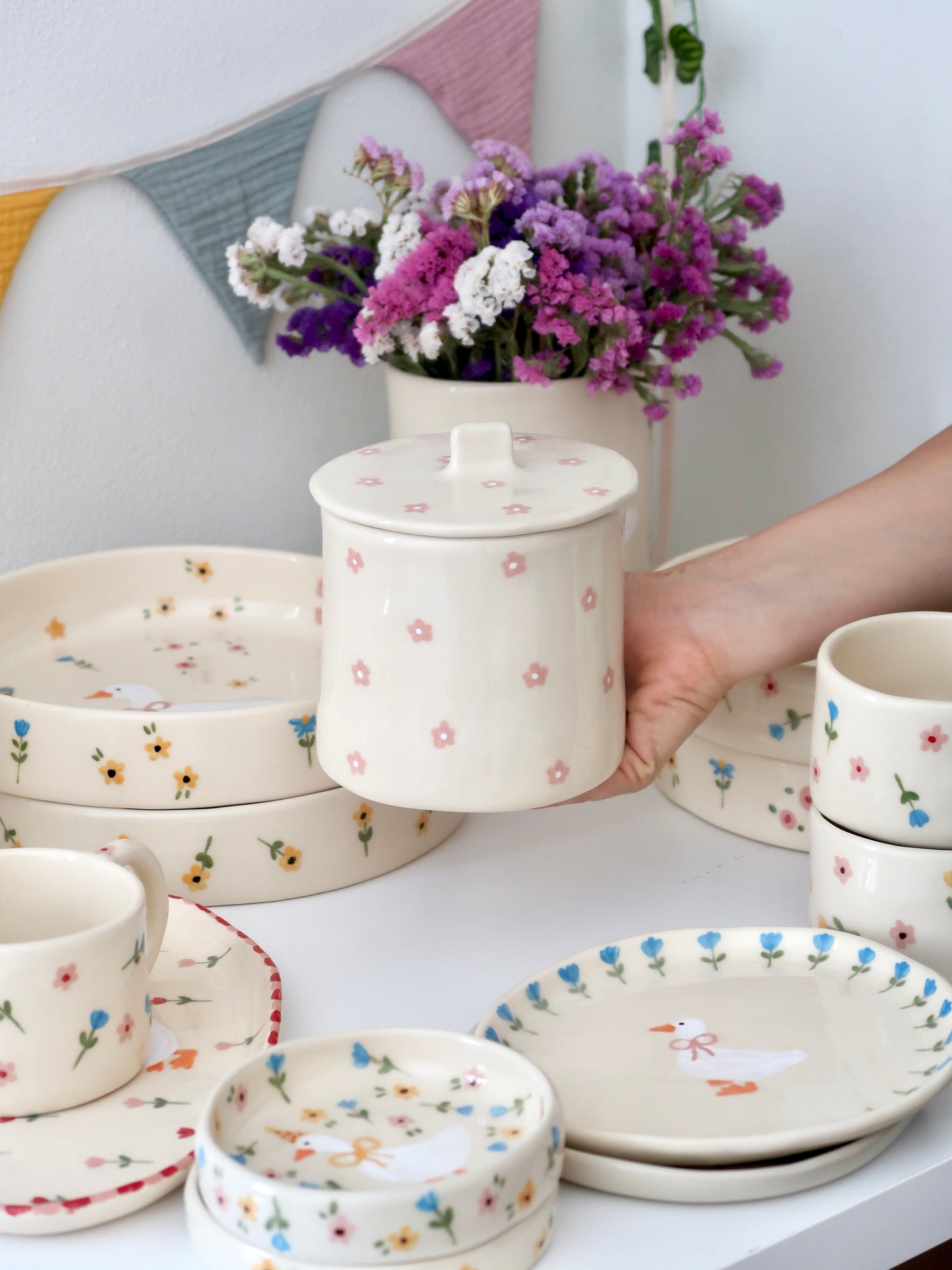 Pot with pink flowers