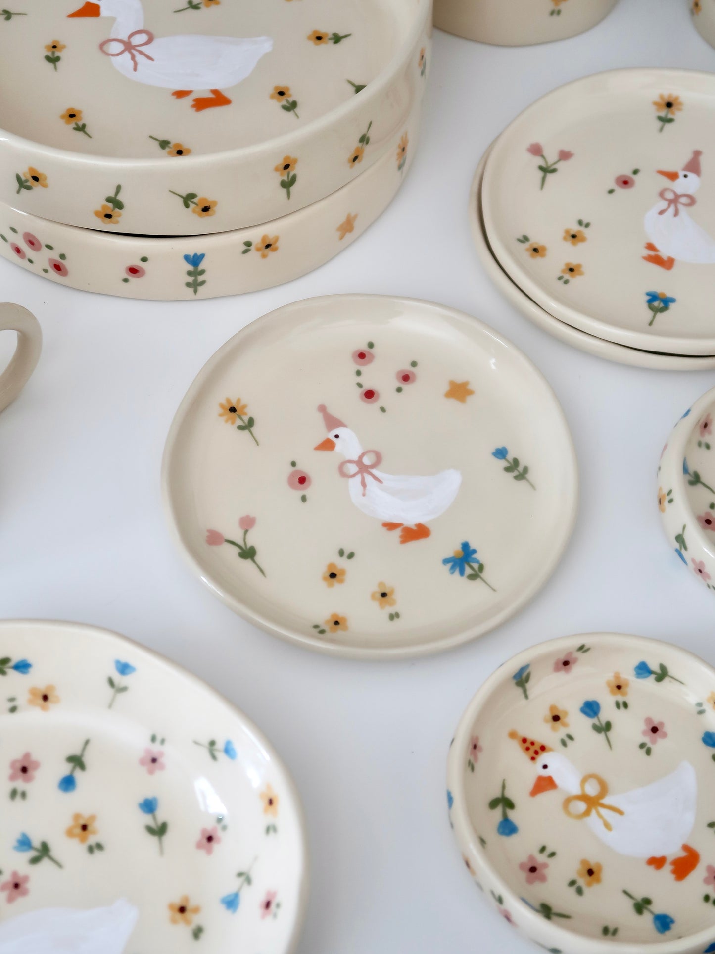 Breakfast/dessert plate with a duck and multicolor flowers