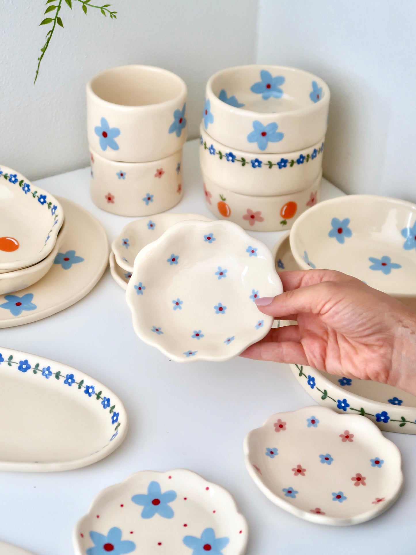 Scalloped ring dish with blue flowers