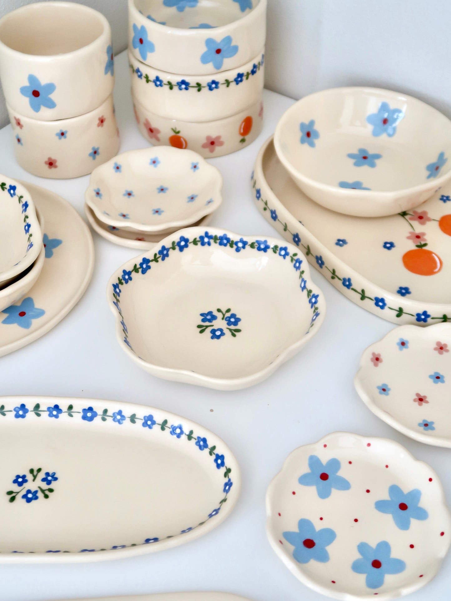 Scalloped bowl with blue flowers flowers