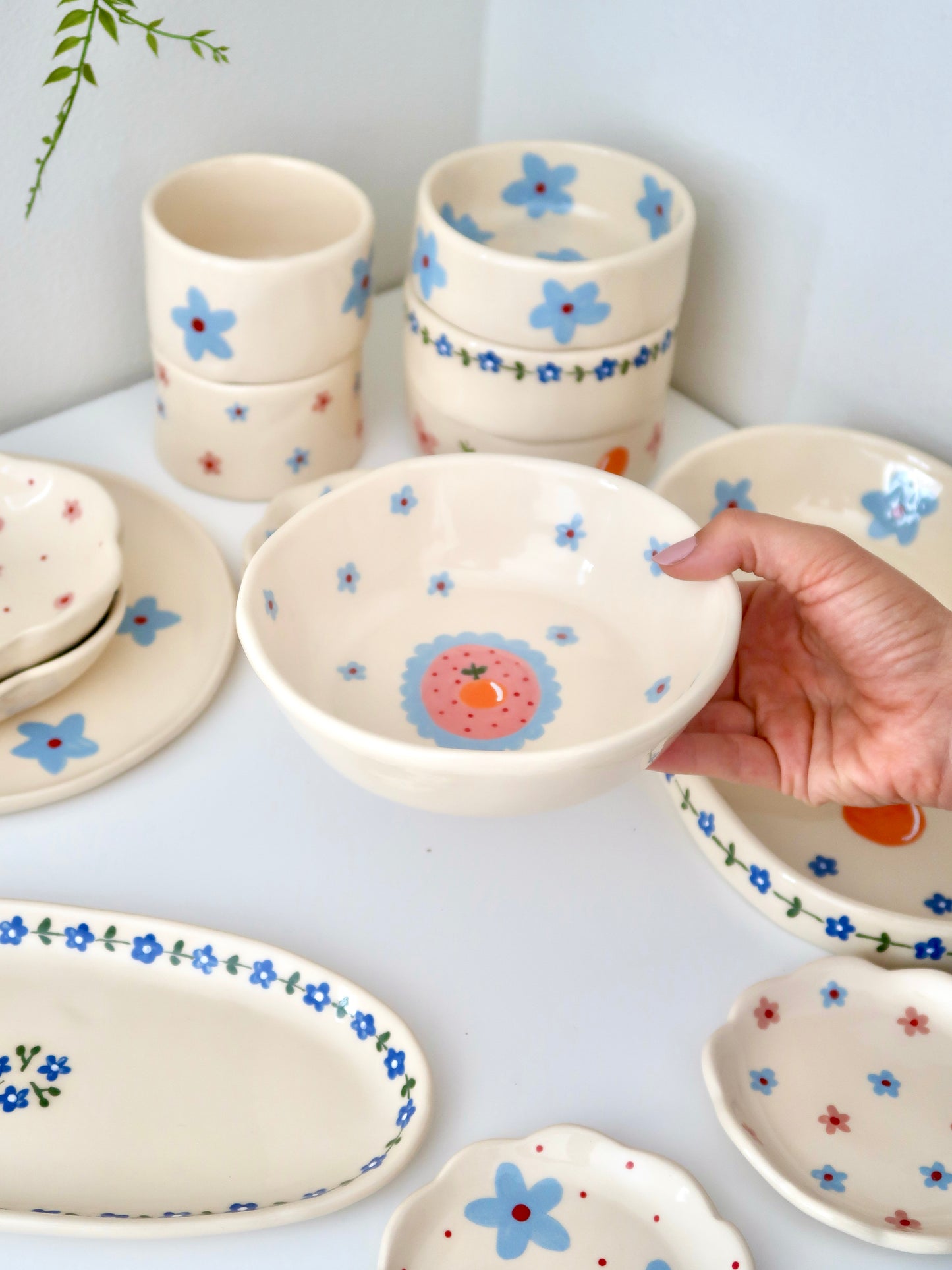 Bowl with orange and blue flowers
