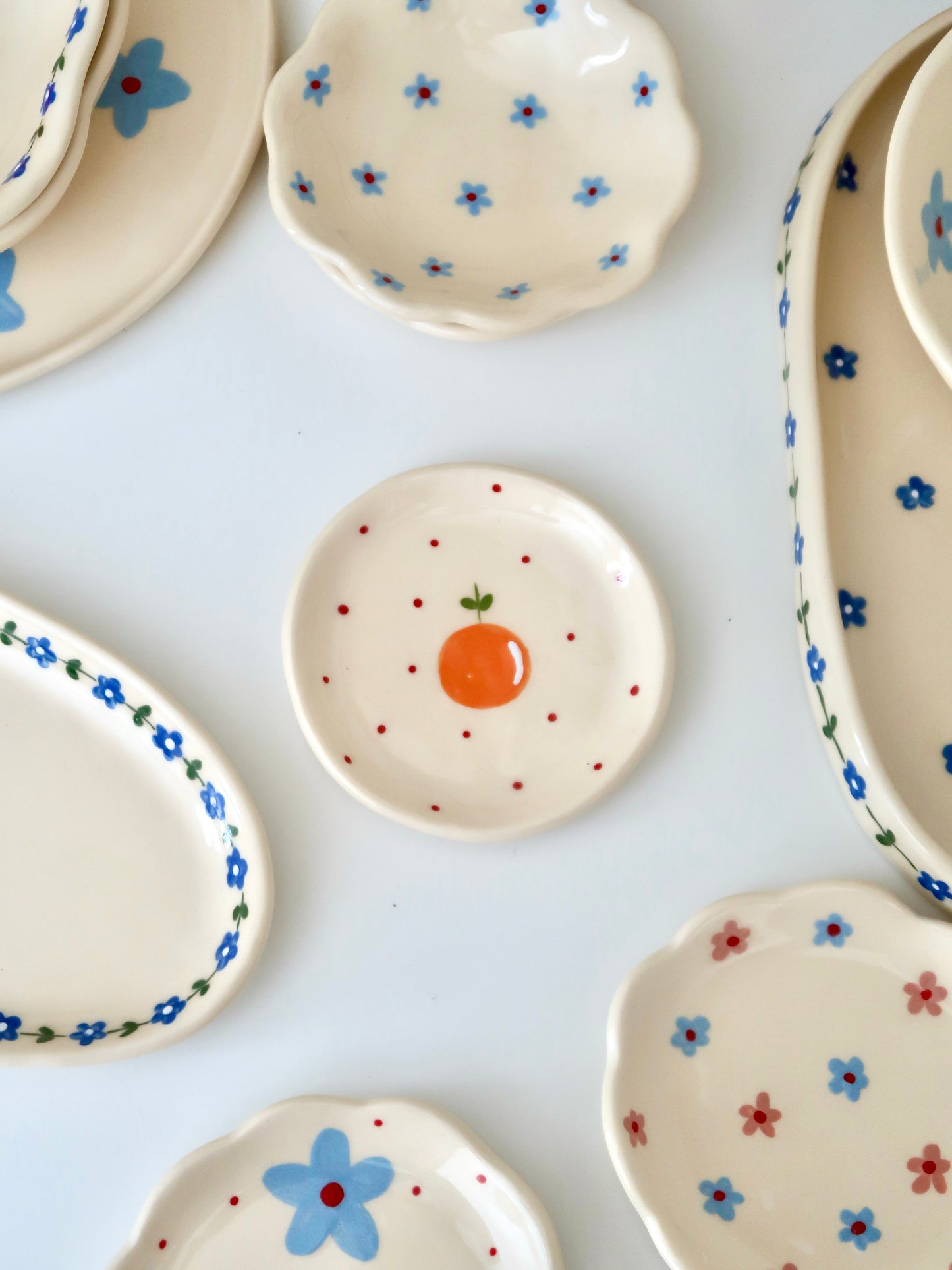 Ring dish with orange and red dots