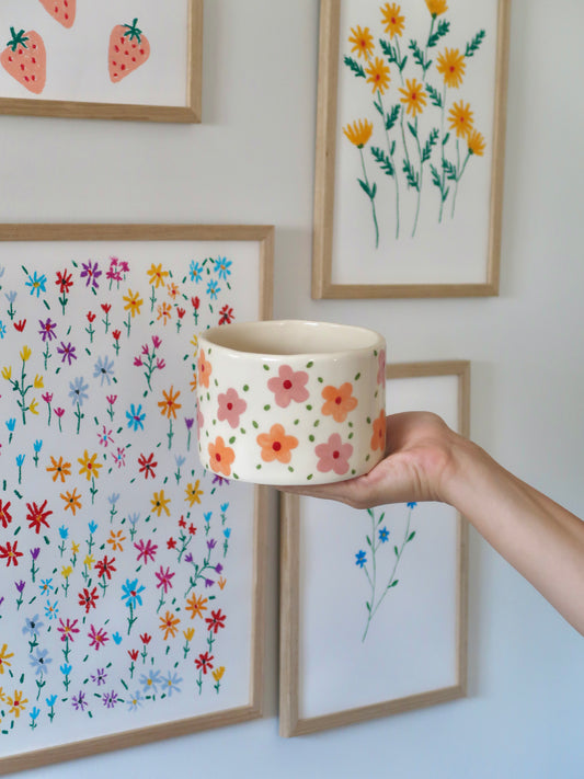 Vase with pink and orange flowers
