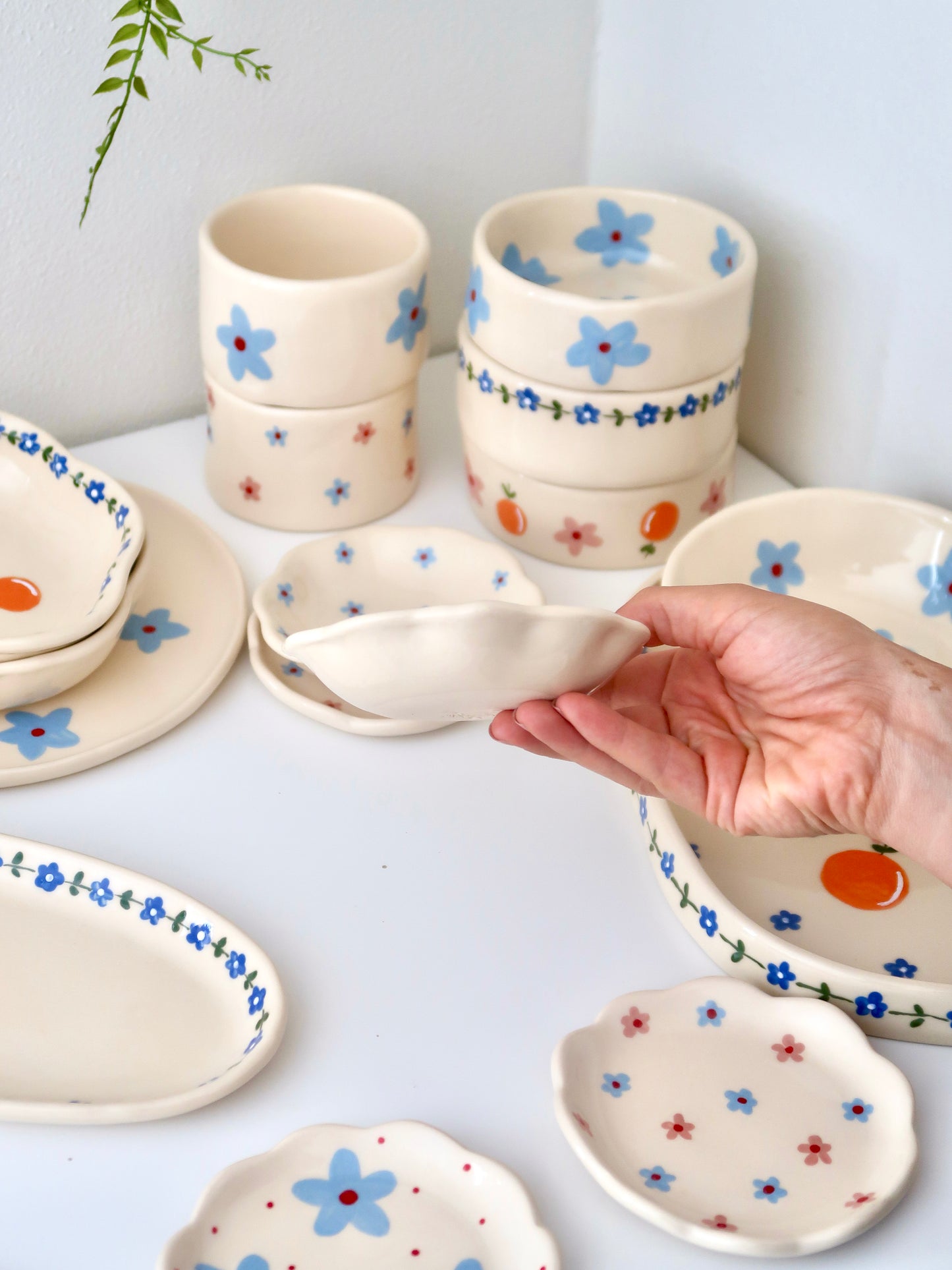 Scalloped ring dish with blue flowers
