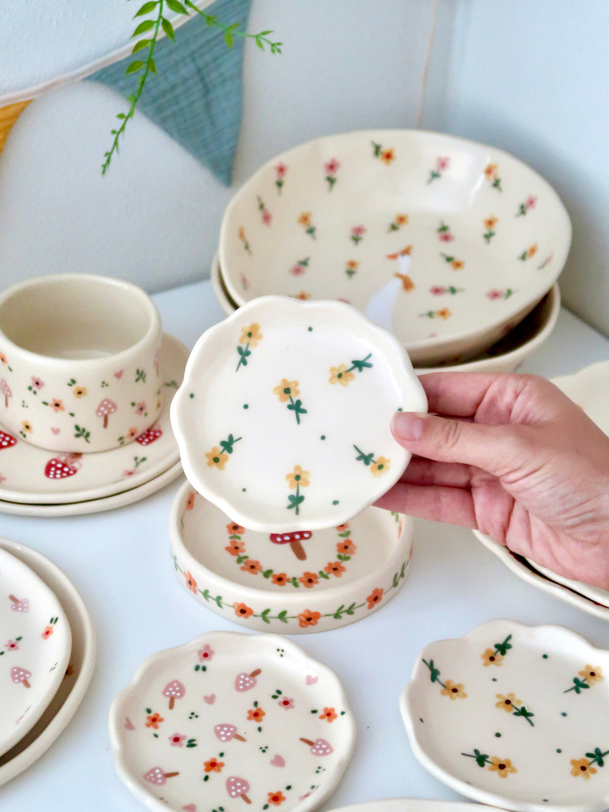 Scalloped ring dish with yellow flowers and green dots