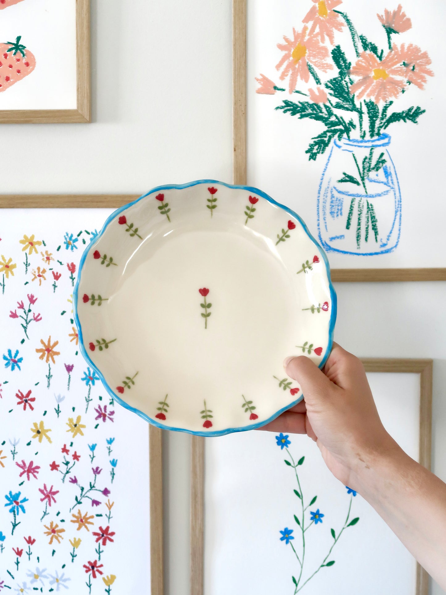 Scalloped plate with red flowers