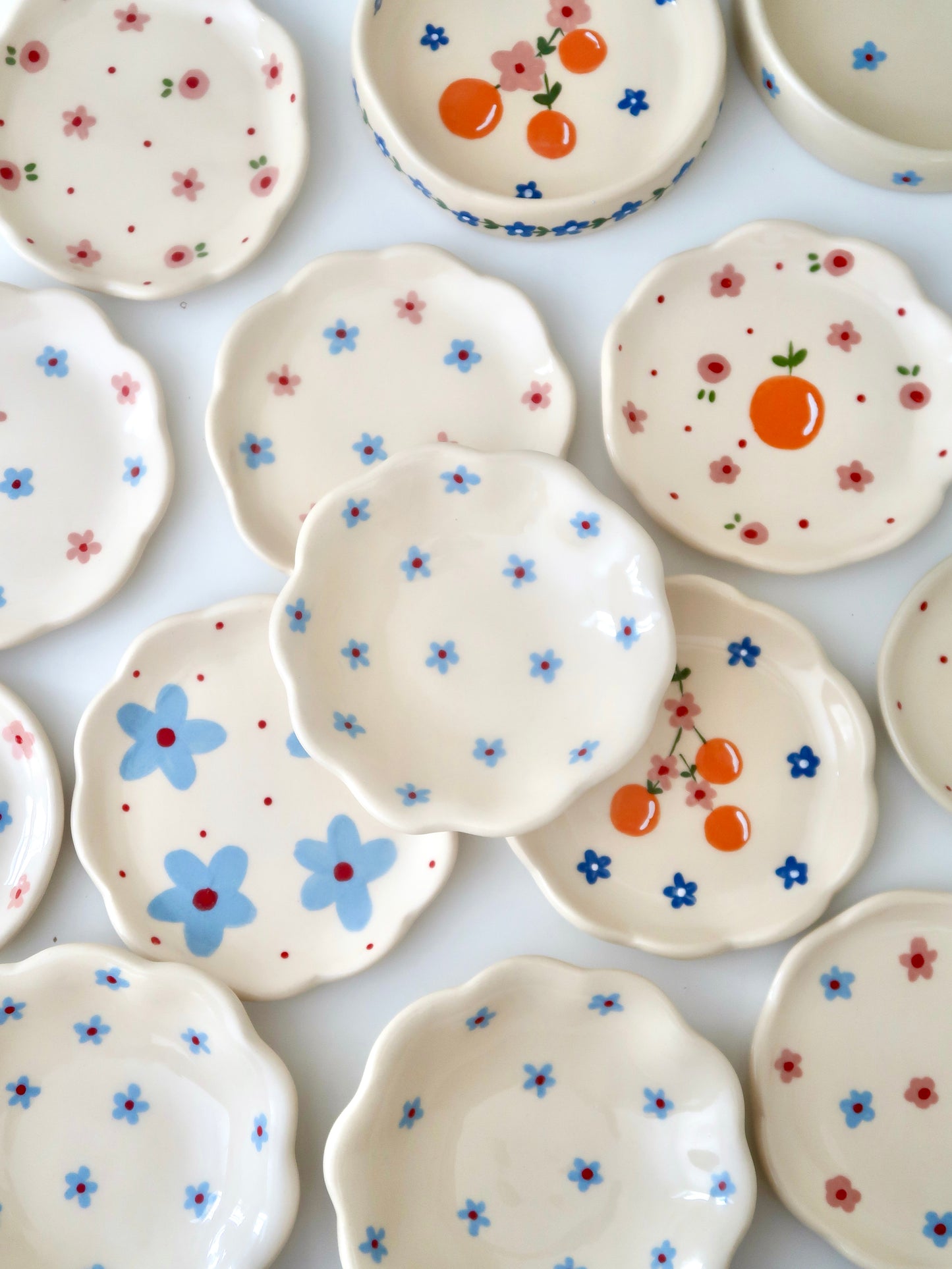 Scalloped ring dish with blue flowers