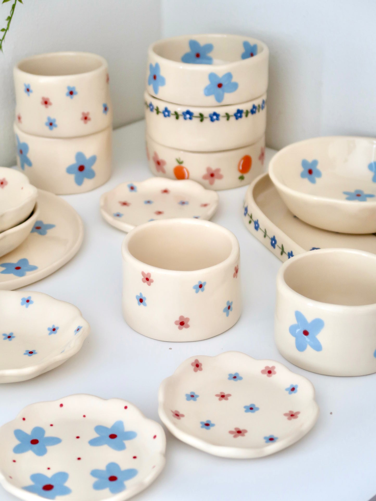 Small vase/ cup with pink and blue flowers