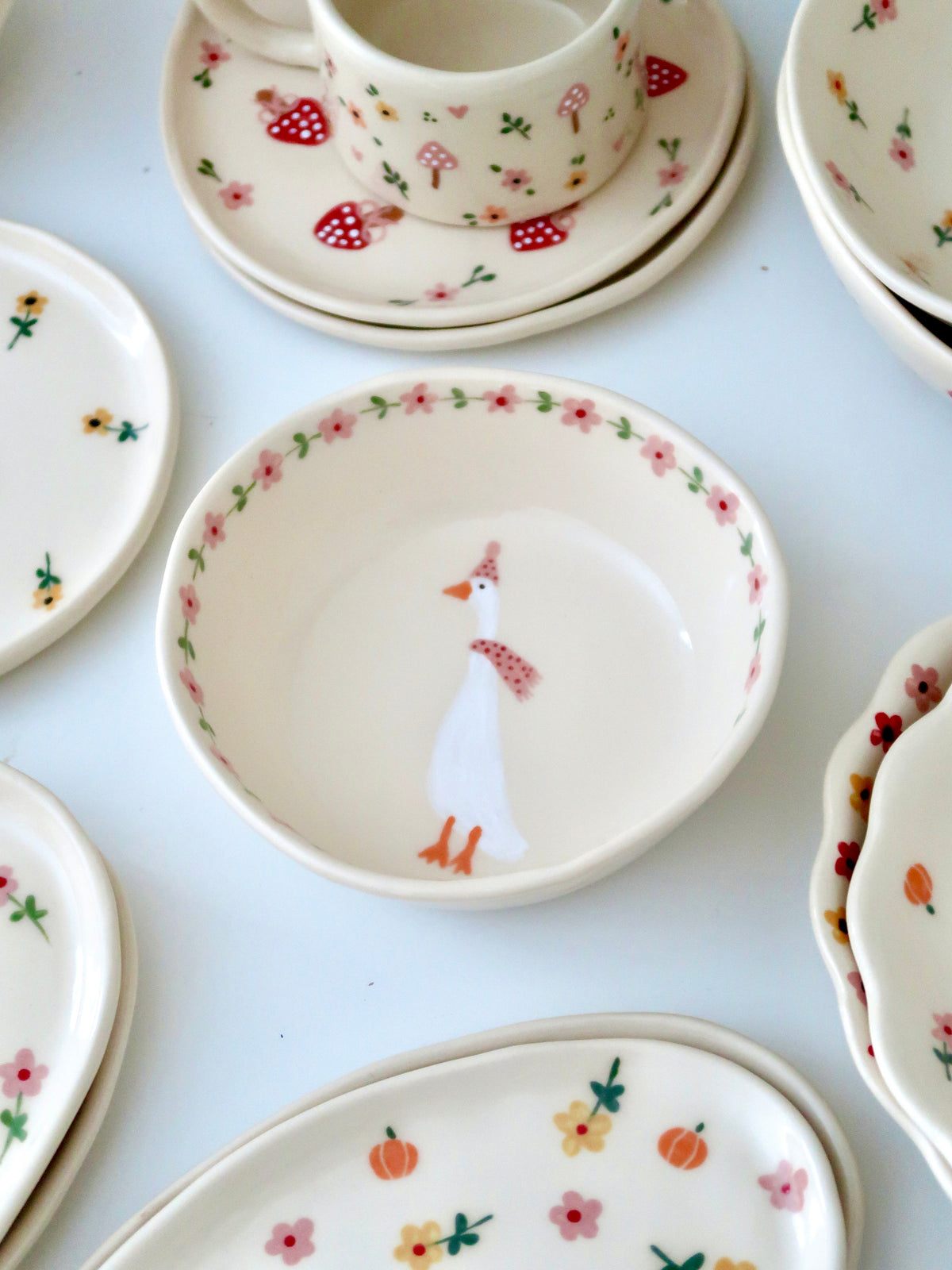 Bowl with a duck and pink flowers