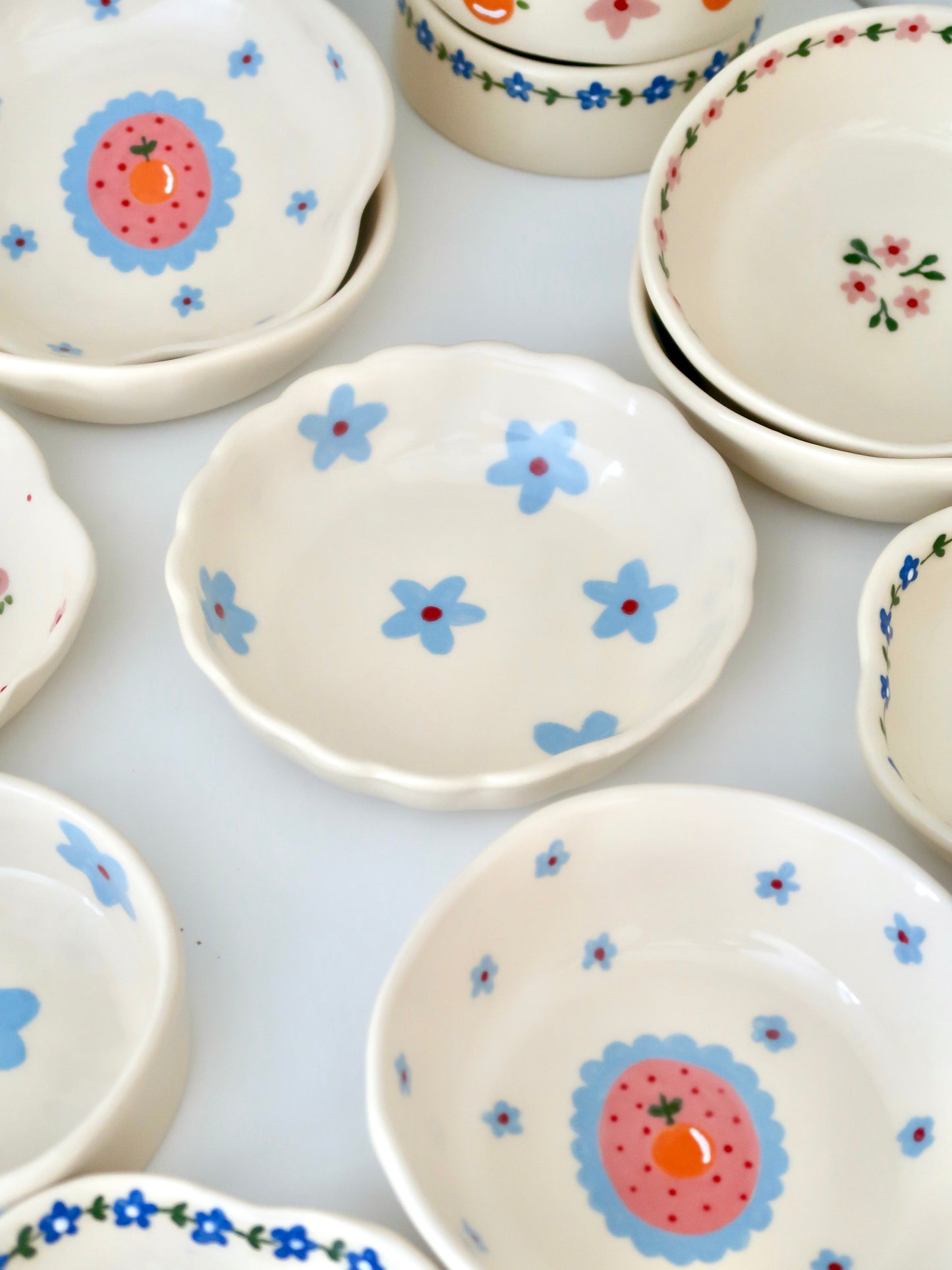 Scalloped bowl with blue flowers flowers