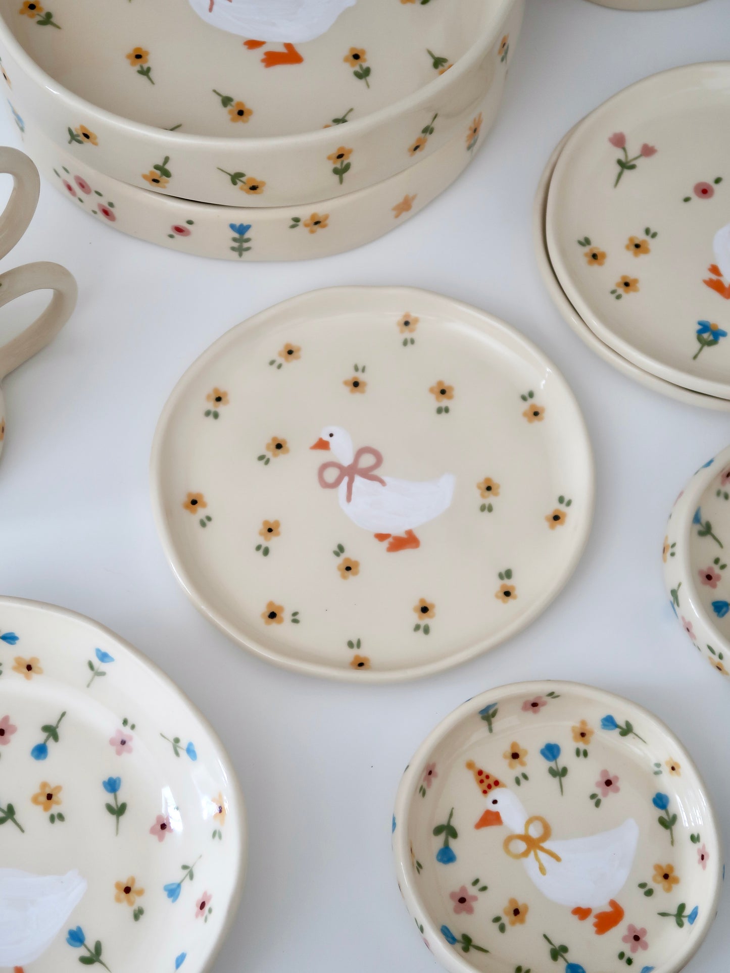 Breakfast/dessert plate with a duck and yellow flowers