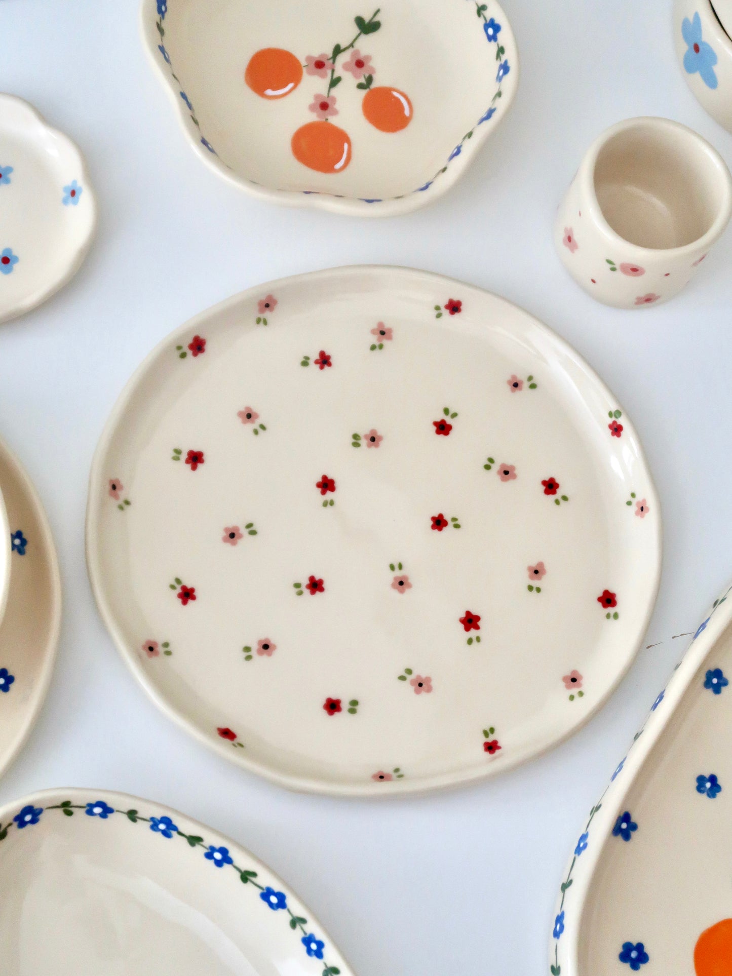 Plate with red and pink flowers