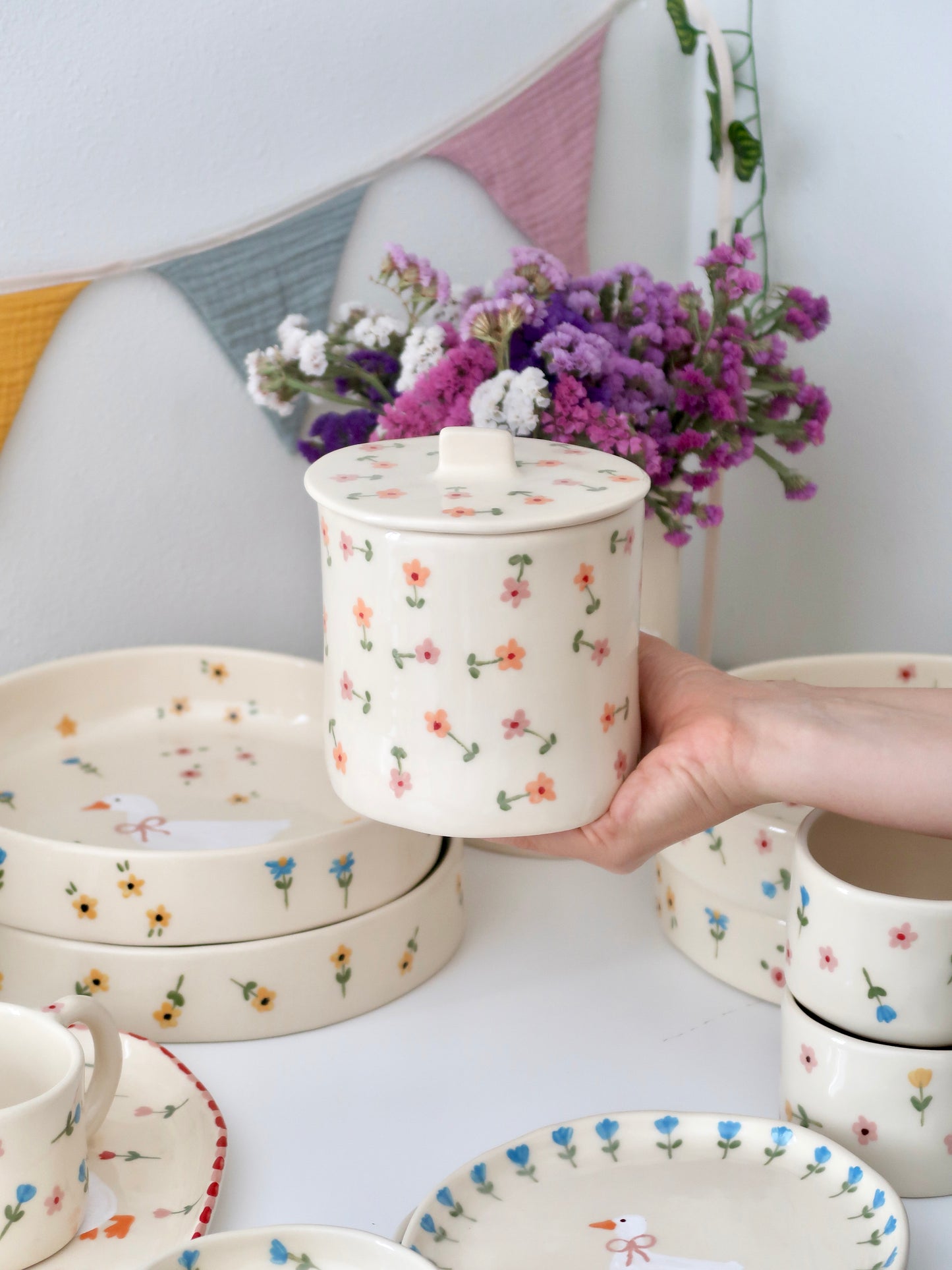 Pot with orange and pink flowers