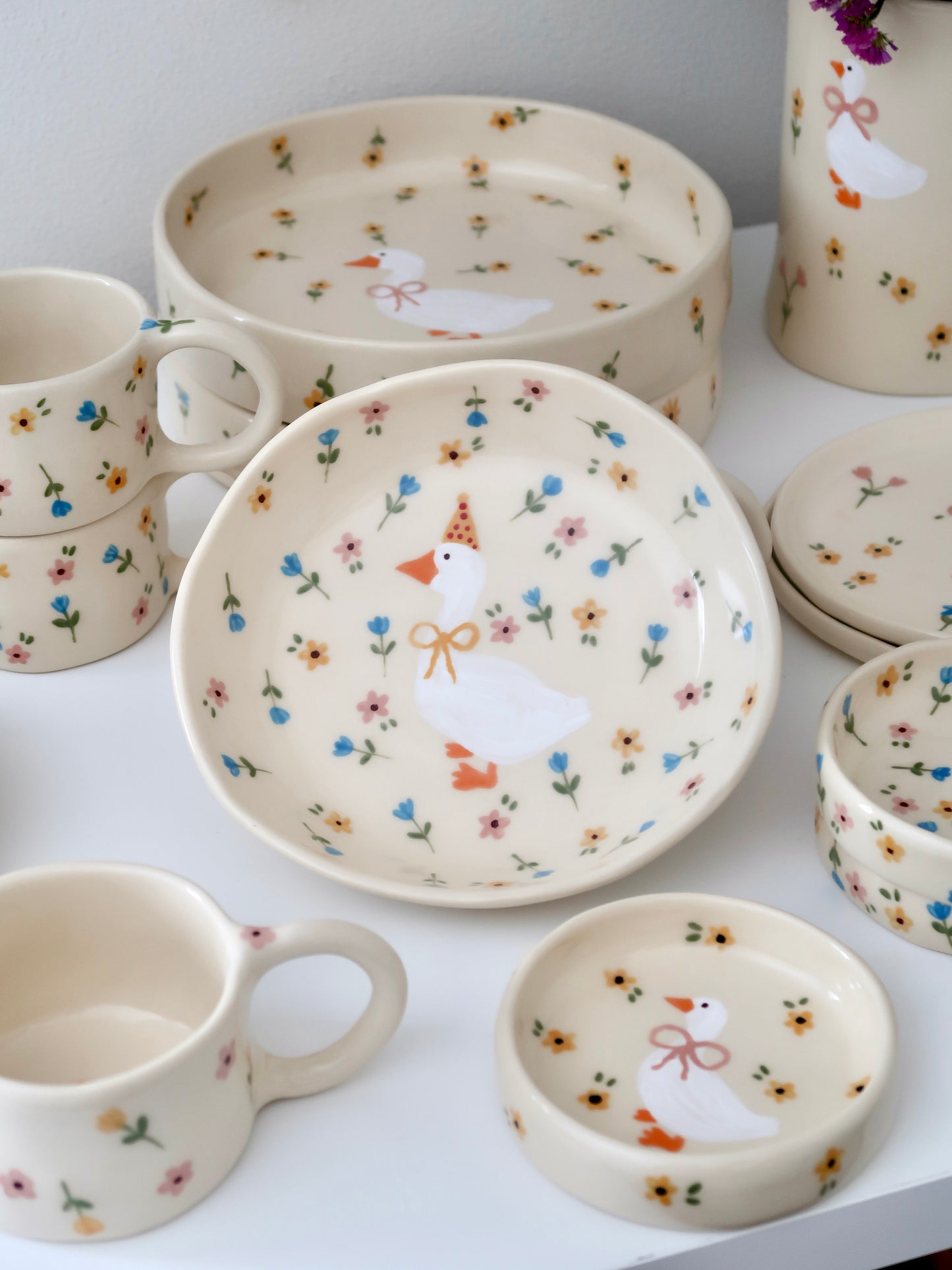 Bowl with a duck and multicolor flowers