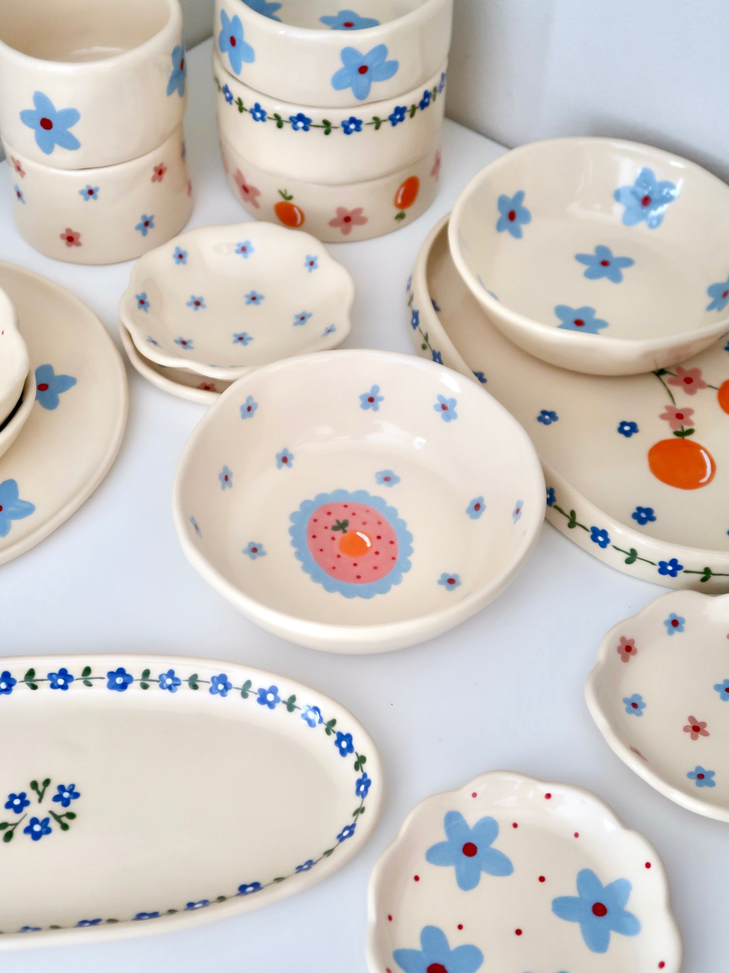 Bowl with orange and blue flowers