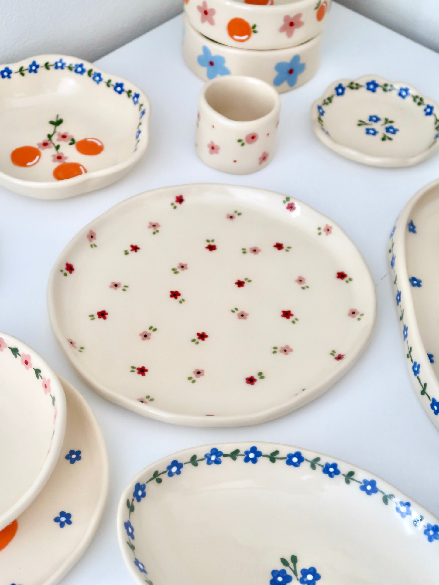 Plate with red and pink flowers