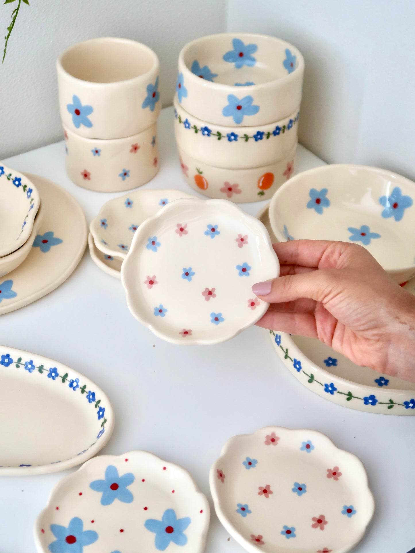 Scalloped ring dish with pink and blue flowers