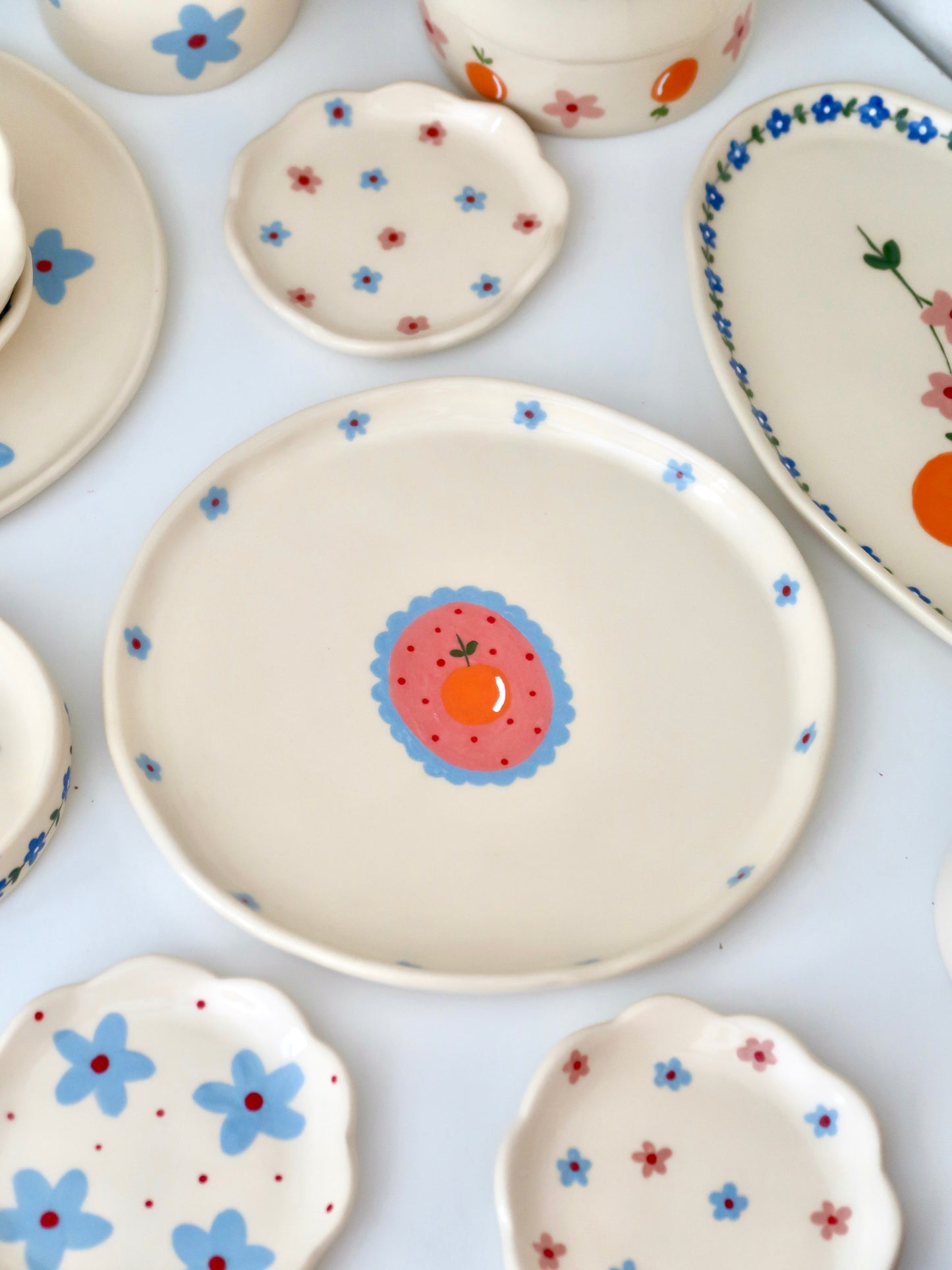 Plate with orange and blue flowers