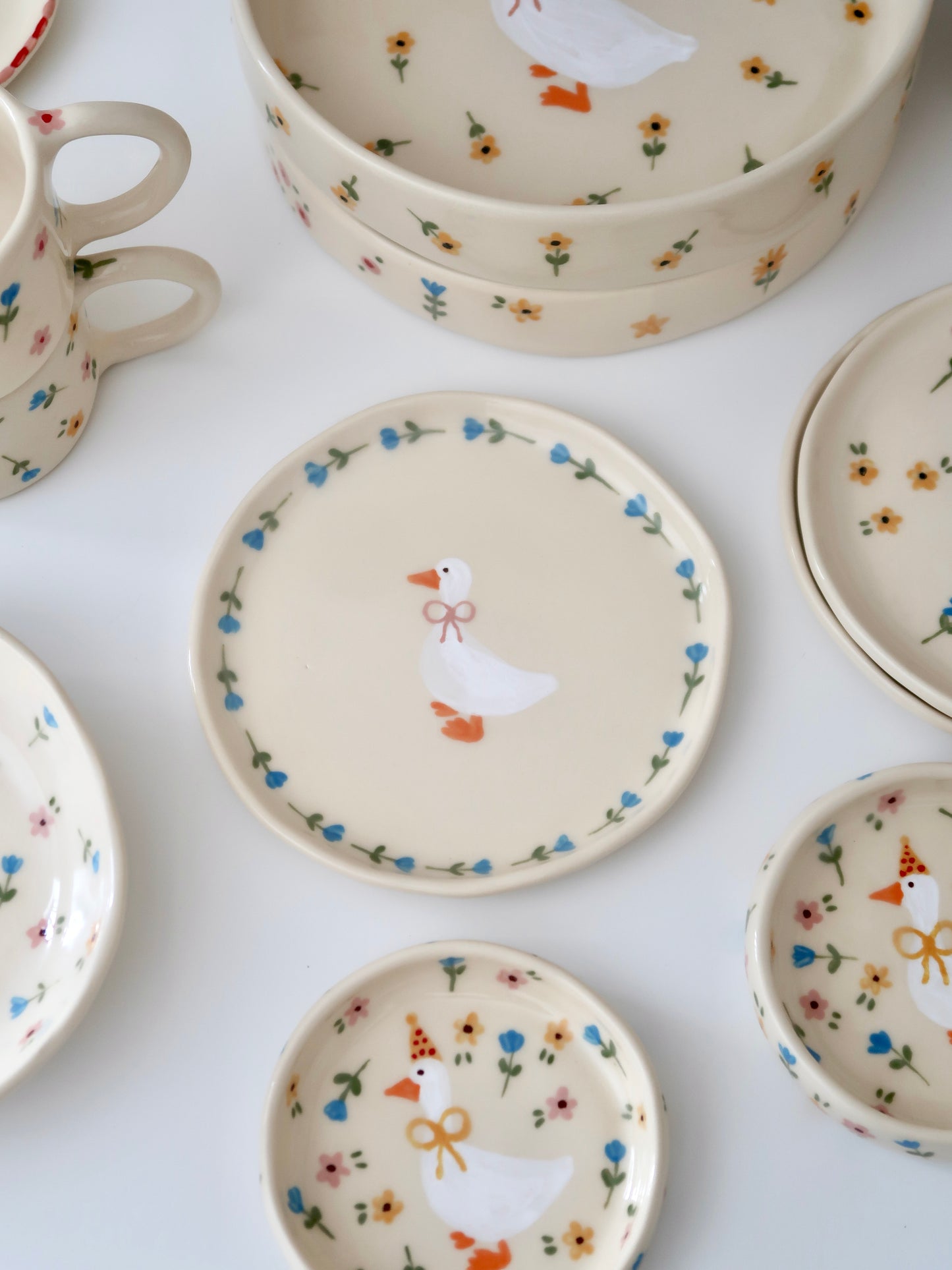 Breakfast/dessert plate with a duck and blue flowers