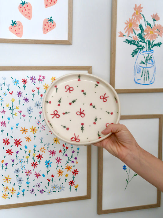 High edge plate with red flowers and bows