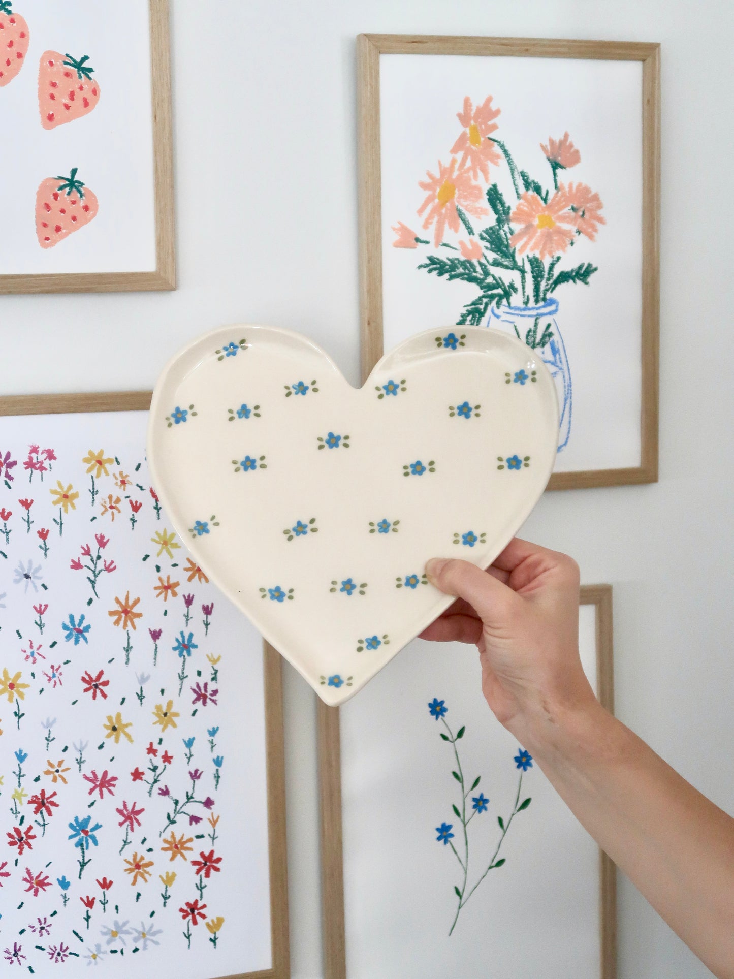 Large heart shaped plate with blue flowers (small imperfection)