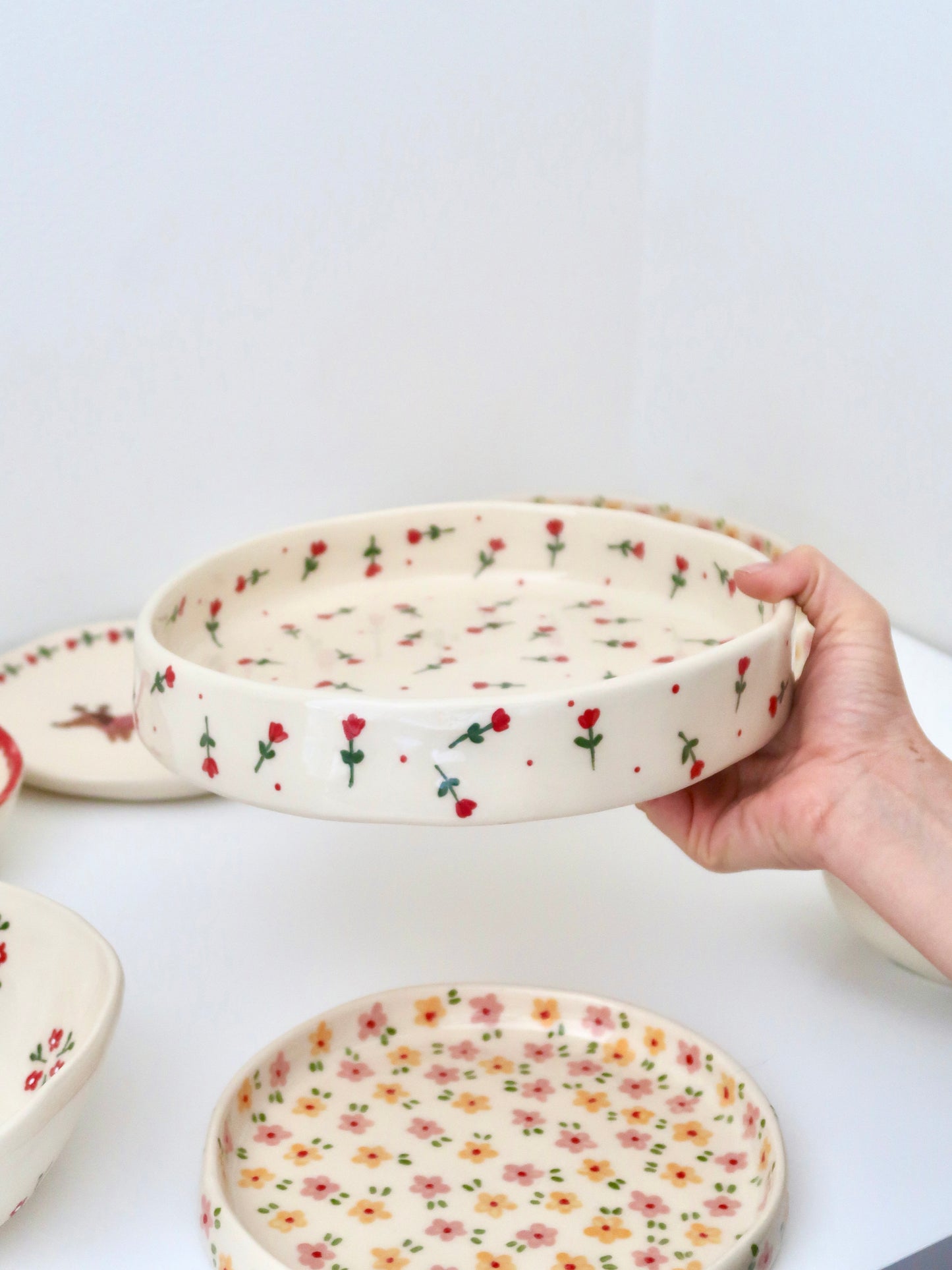 Large bowl with red flowers and red dots