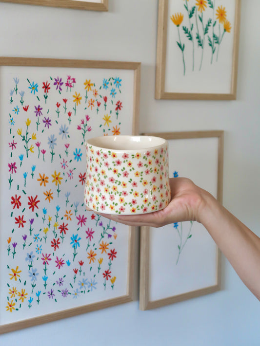 Vase with pink and yellow flowers