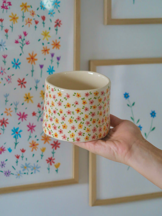 Vase with pink and yellow flowers