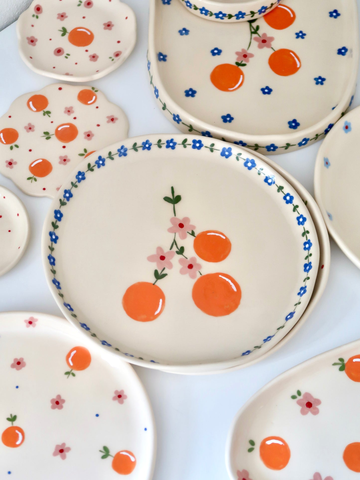Plate with orange and blue flowers