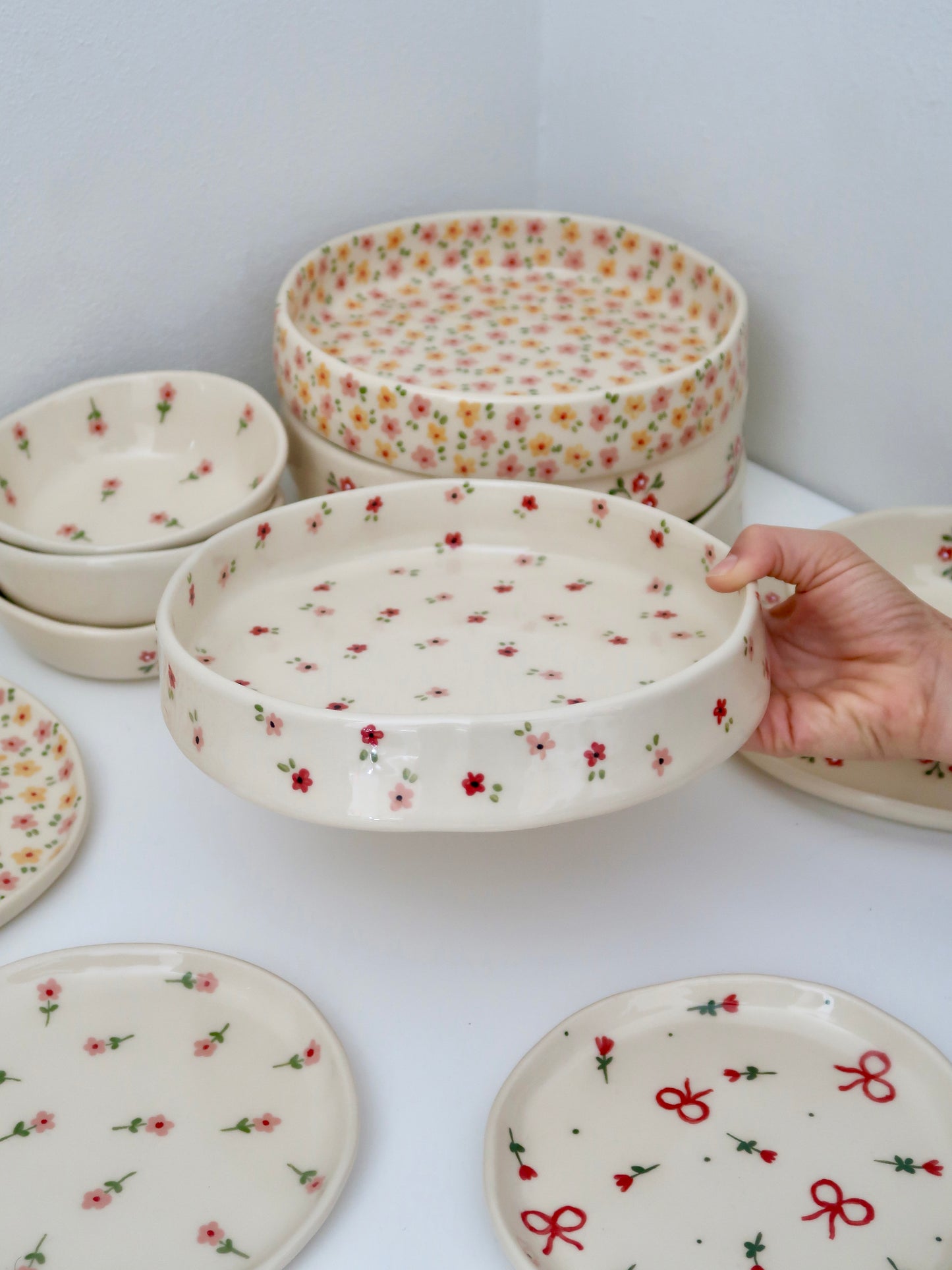 Large bowl with red and pink flowers