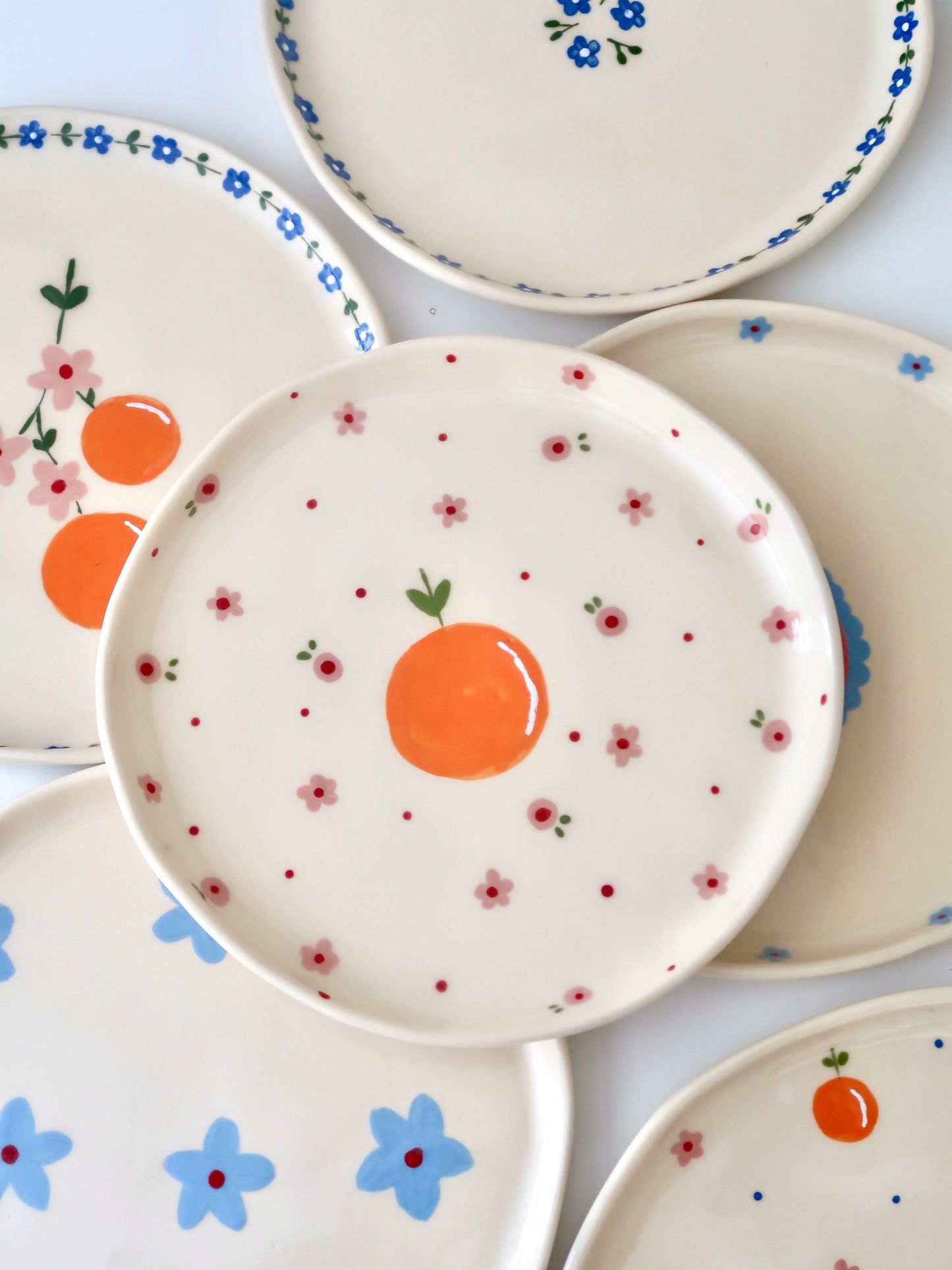 Plate with orange and pink flowers