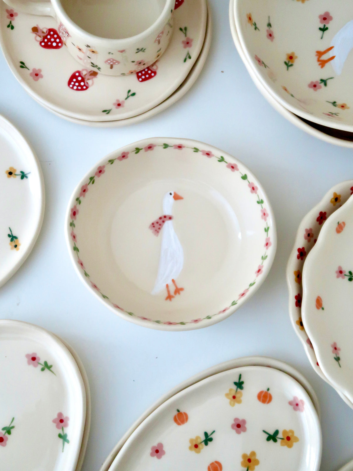 Bowl with a duck and pink flowers