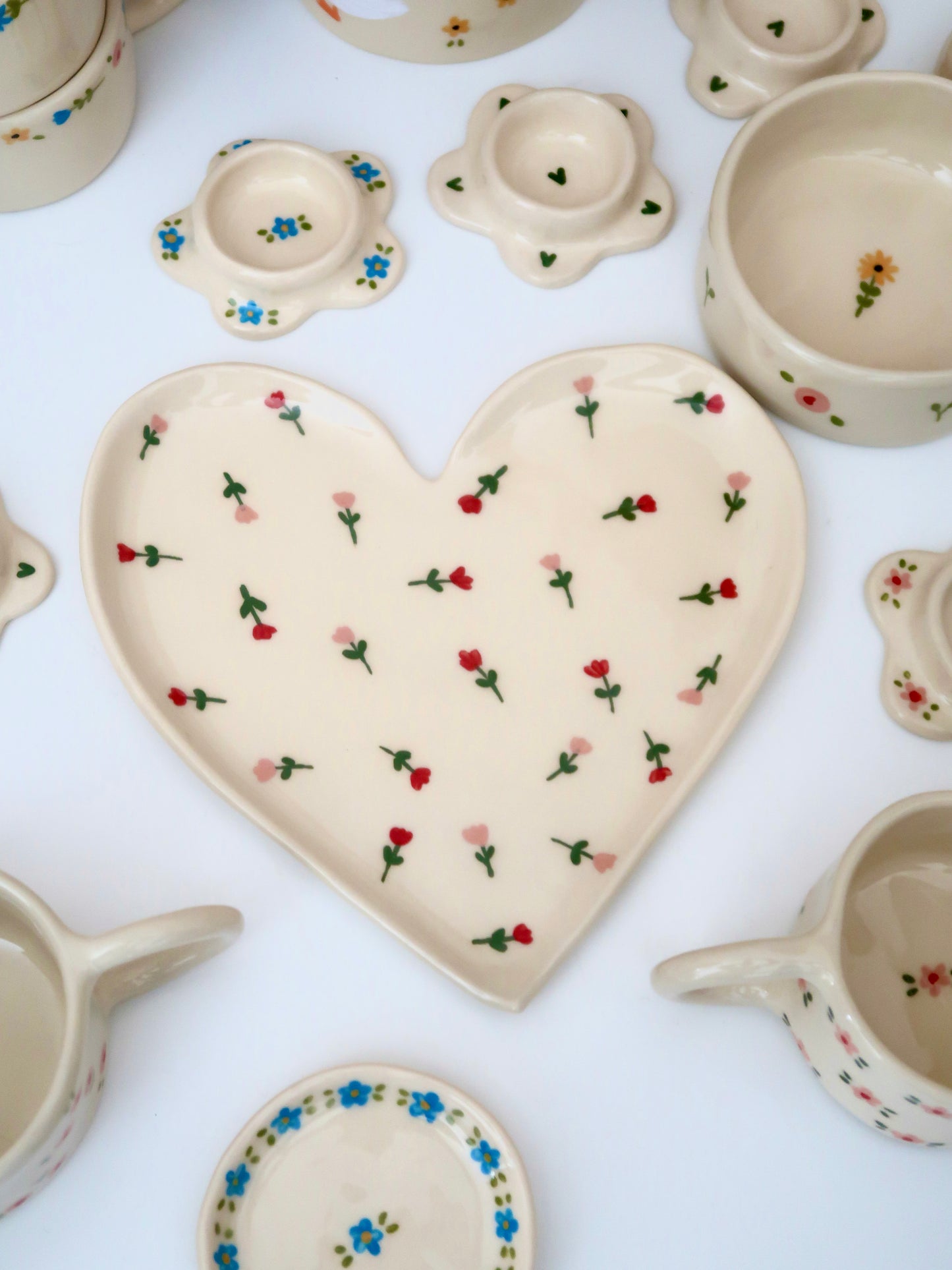 Large heart shaped plate with pink and red flowers