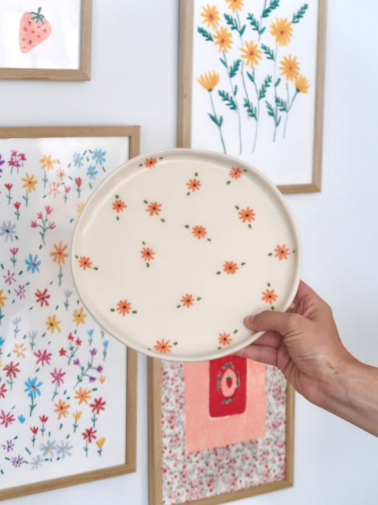Plate with orange flowers
