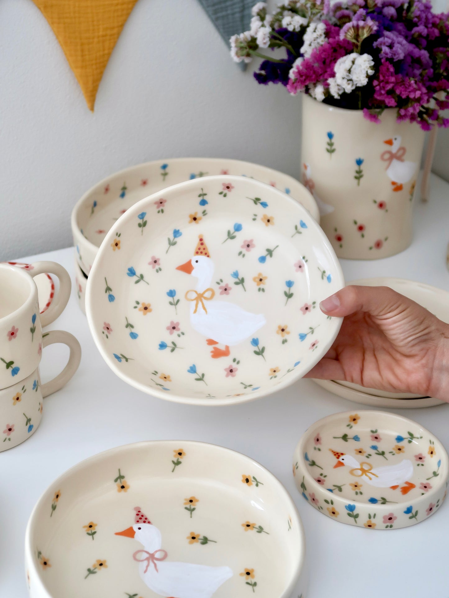Bowl with a duck and multicolor flowers