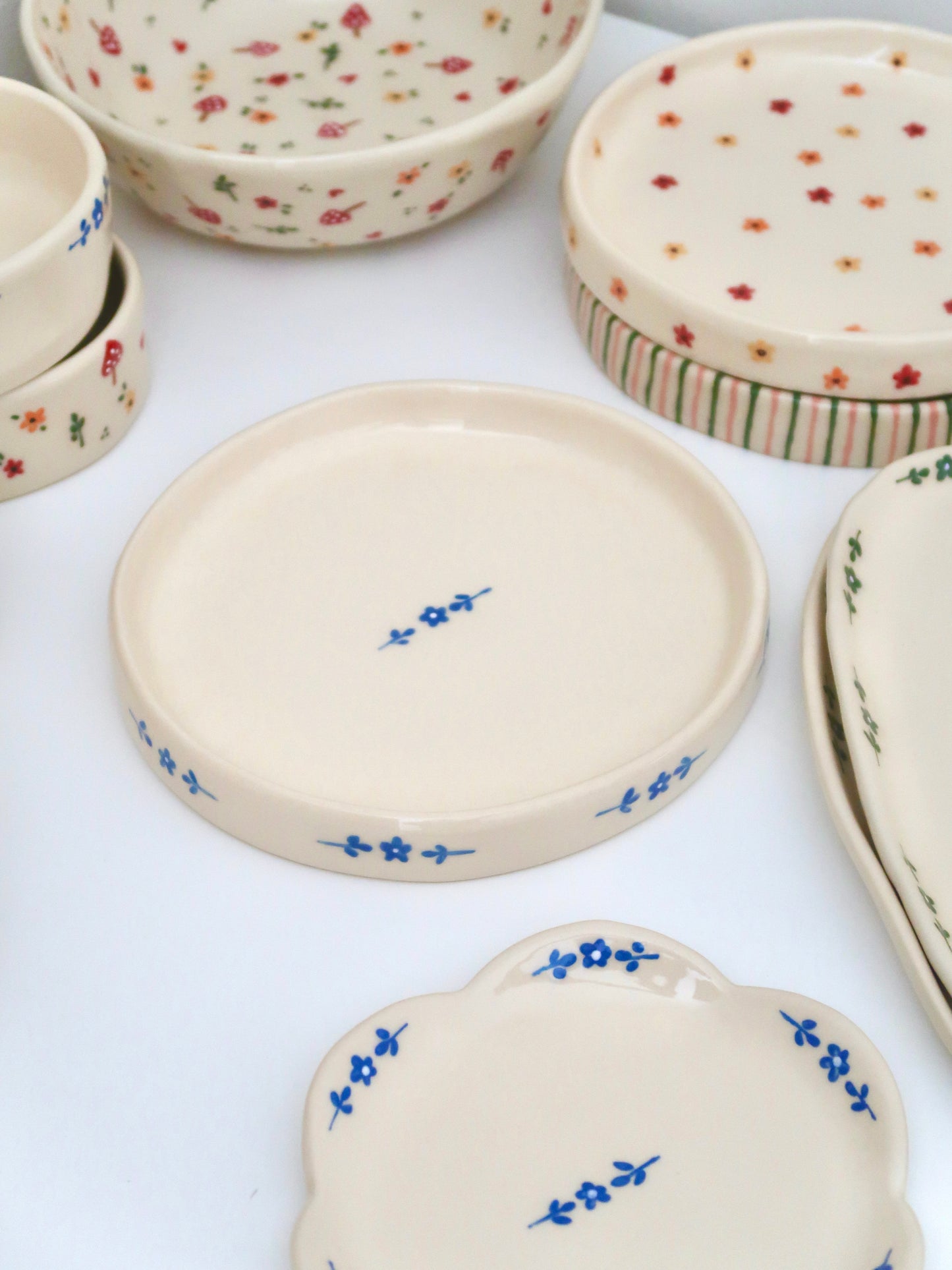 High edge plate with blue flowers