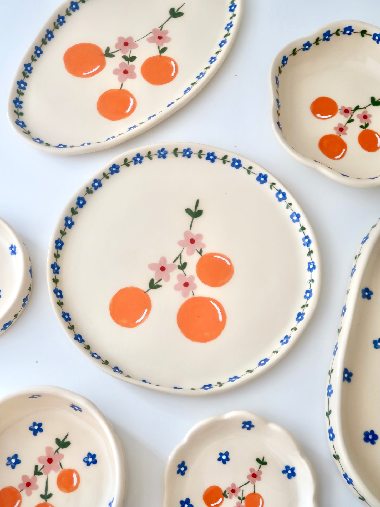 Plate with orange and blue flowers