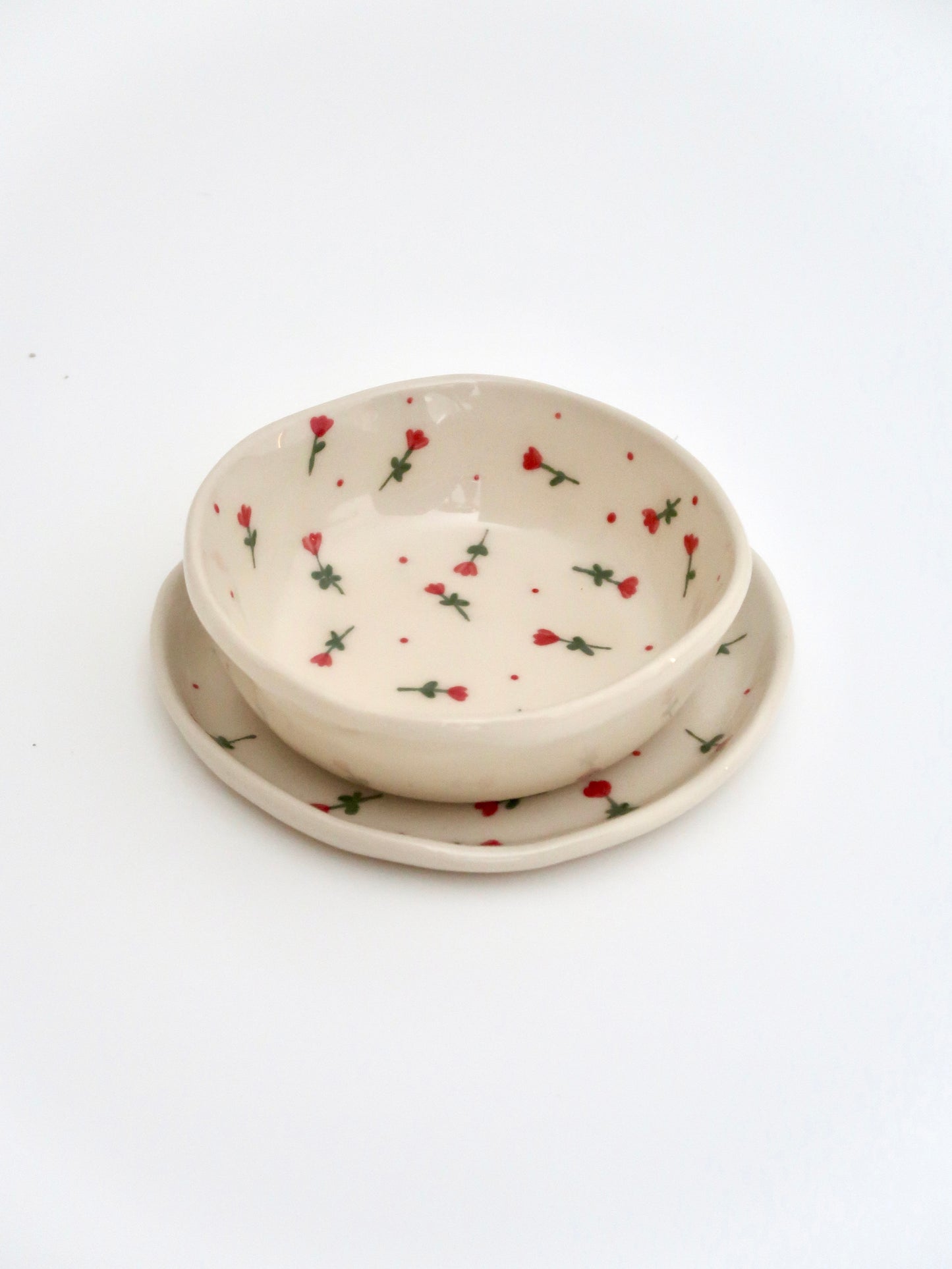 Set with red flowers and red dots