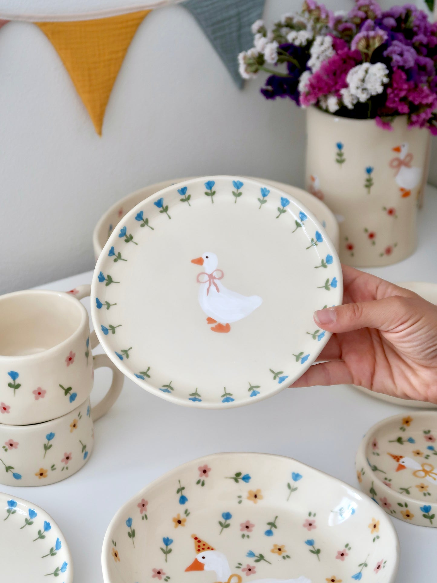 Breakfast/dessert plate with a duck and blue flowers