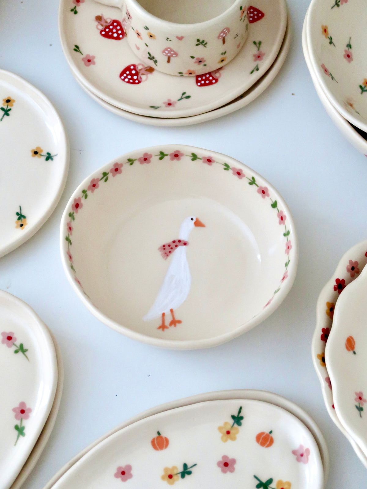 Bowl with a duck and pink flowers