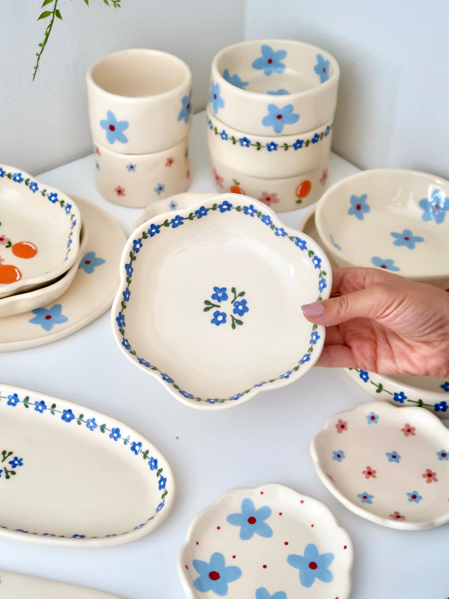 Scalloped bowl with blue flowers flowers