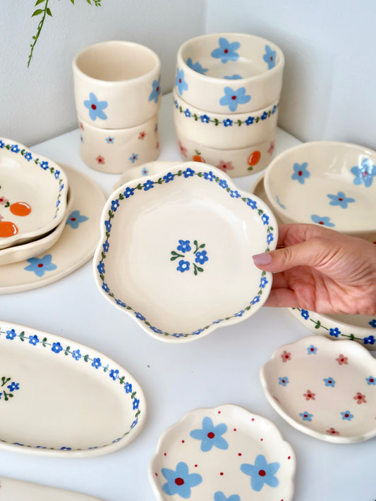 Scalloped bowl with blue flowers flowers