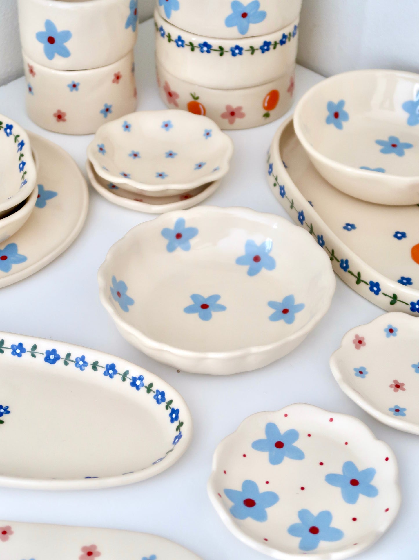 Scalloped bowl with blue flowers flowers