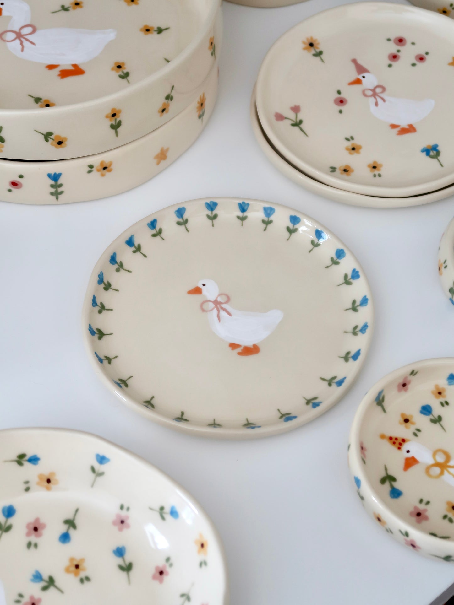 Breakfast/dessert plate with a duck and blue flowers