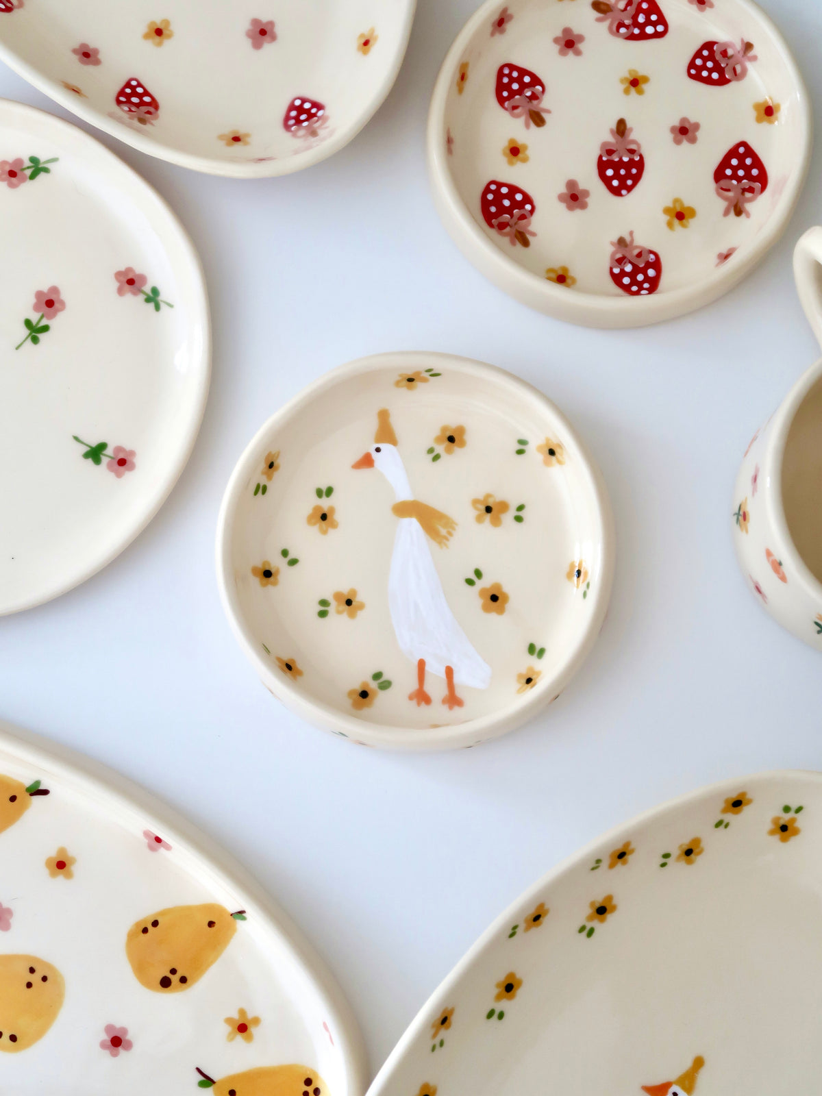 Ring dish with a duck and yellow flowers