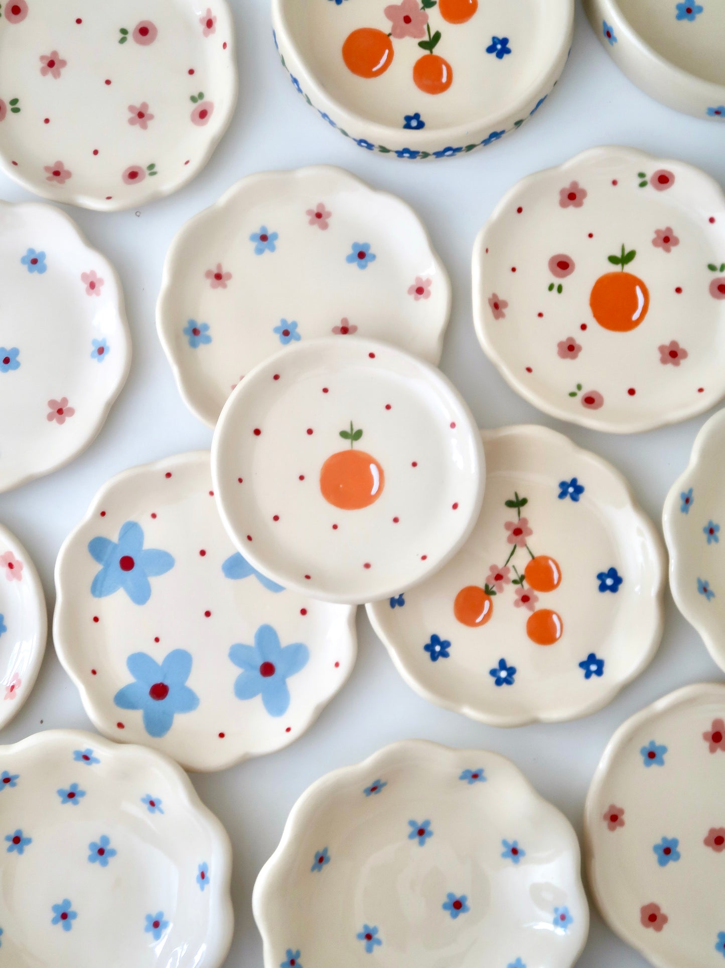 Ring dish with orange and red dots